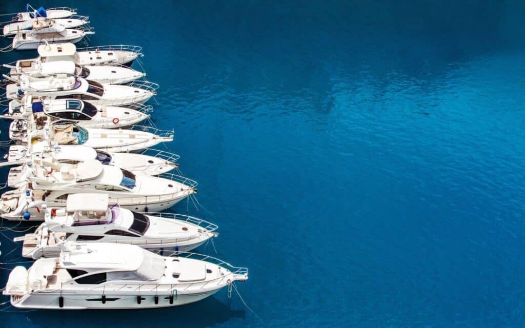 white boats on water